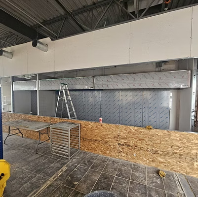 Commercial kitchen exhaust installation in progress
